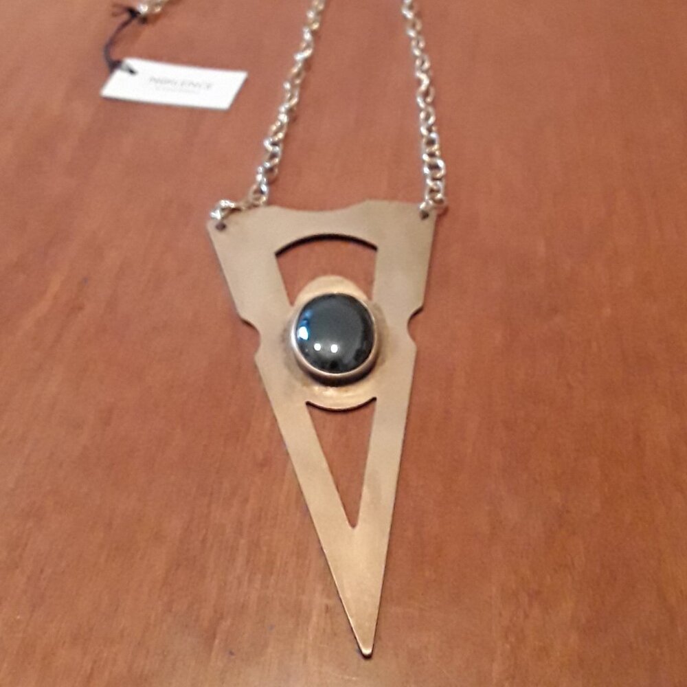 Large geometric statement necklace by Noilence